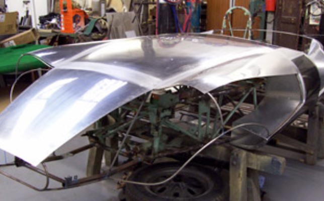 Elva Mk3 front section under construction showing the panels being formed around the wire pattern